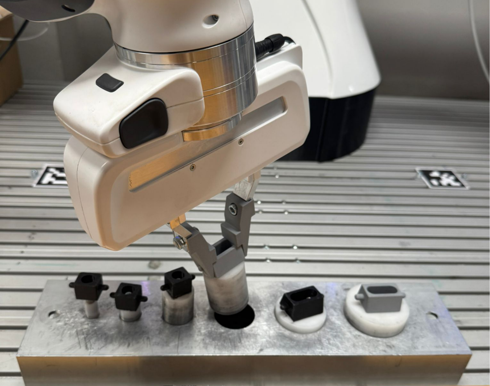 Robot aligning a cylindrical peg held in a parallel gripper with a fixture opening